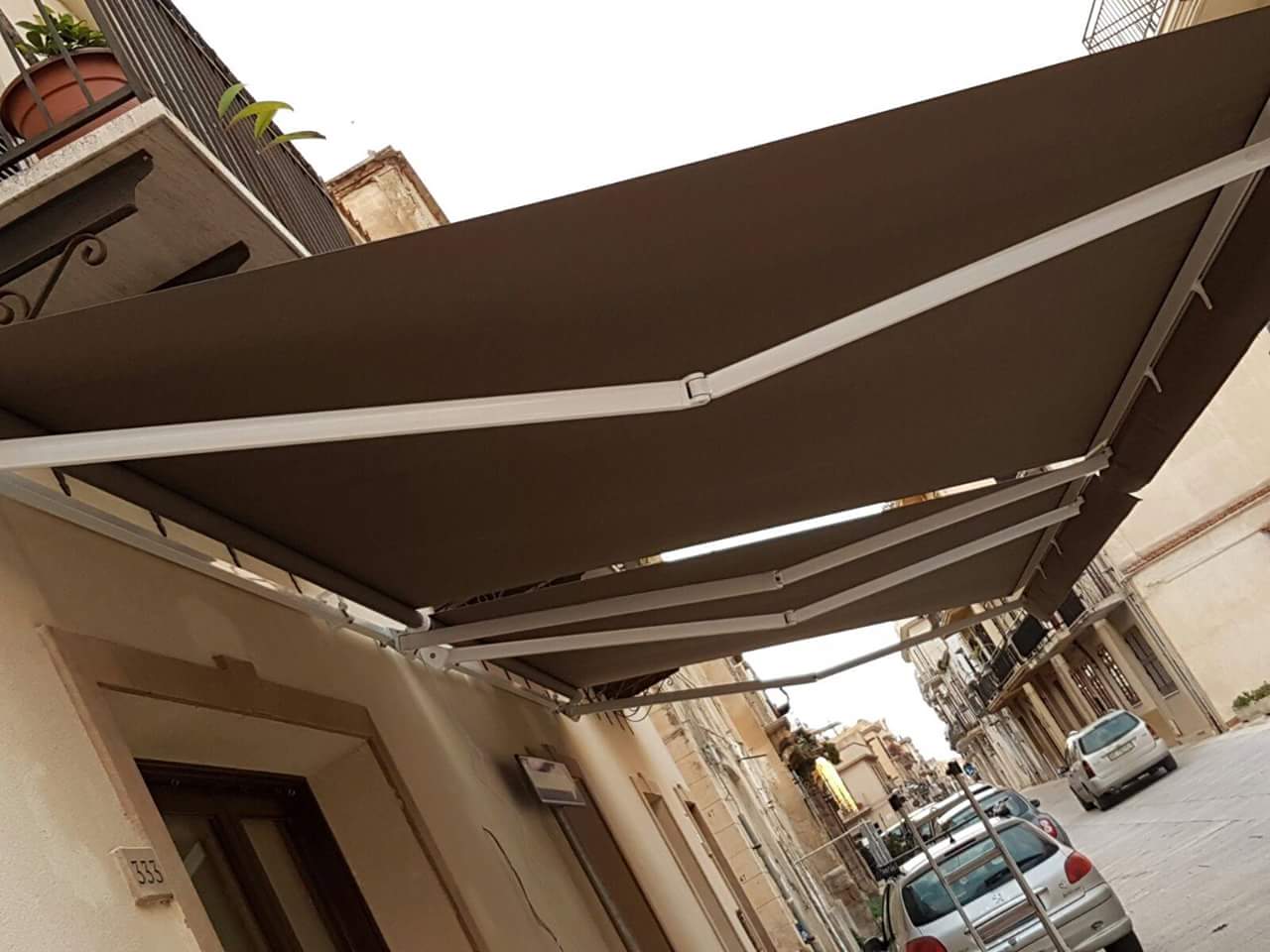 Tenda da sole a bracci estensibili